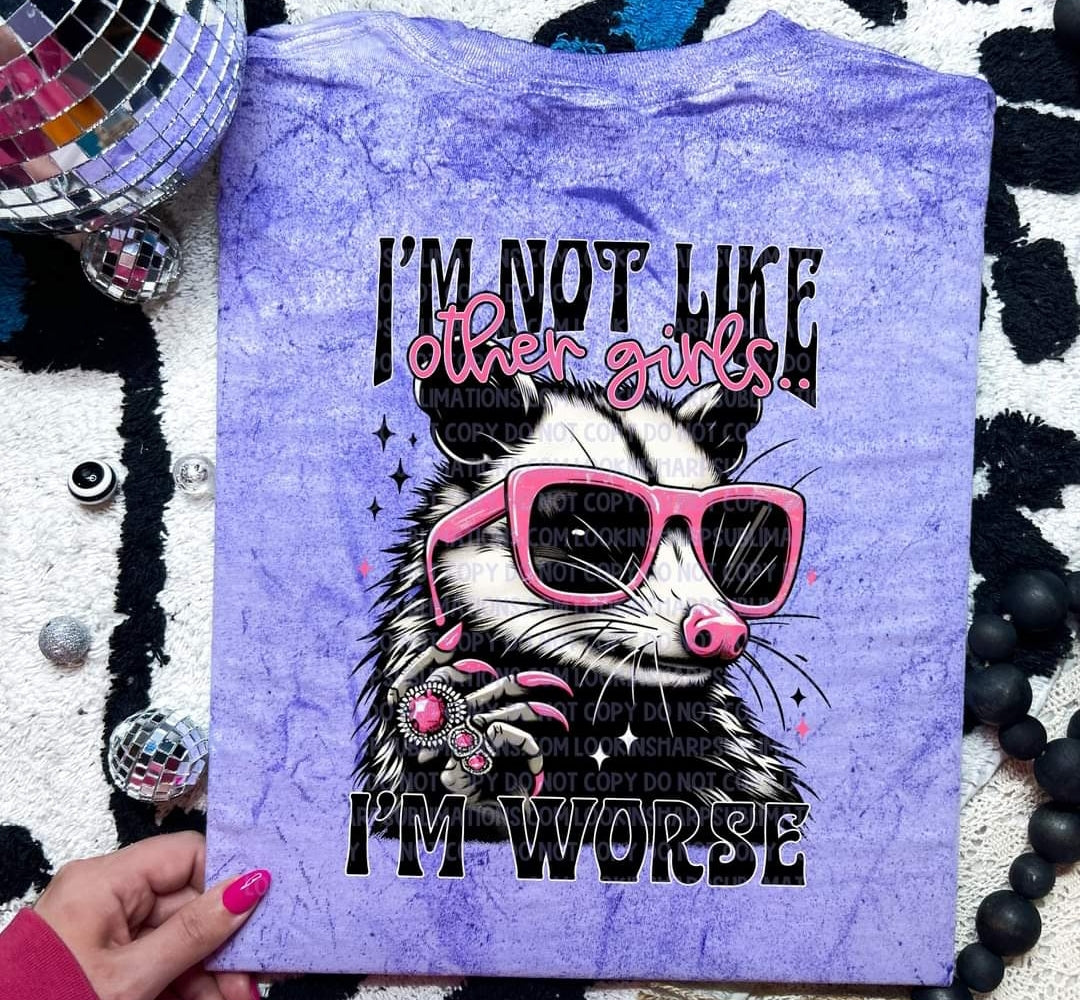 "I'm Not Like Most Girls" Triblend Short Sleeve Shirt